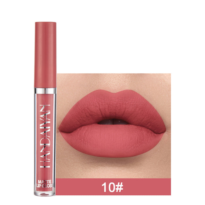 Lip gloss with a close-up of lips wearing the color, brand 'LAN DAWAN' visible.