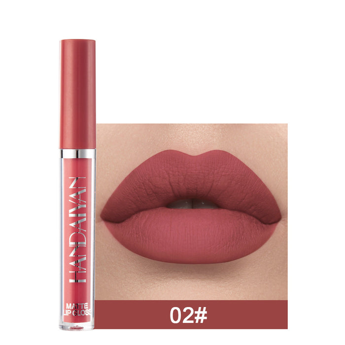 Lipstick with a close-up of lips wearing the color, brand 'Huda Beauty' visible.