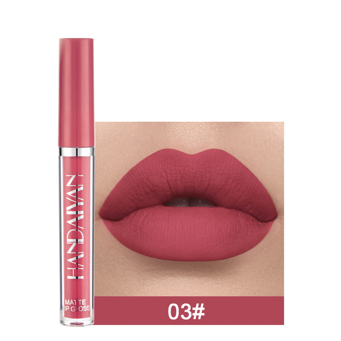Lip gloss with a close-up of lips wearing the color, brand 'HANDAVAN' visible.