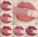 Lanqiu lip gloss with star design on packaging, shown on lips.