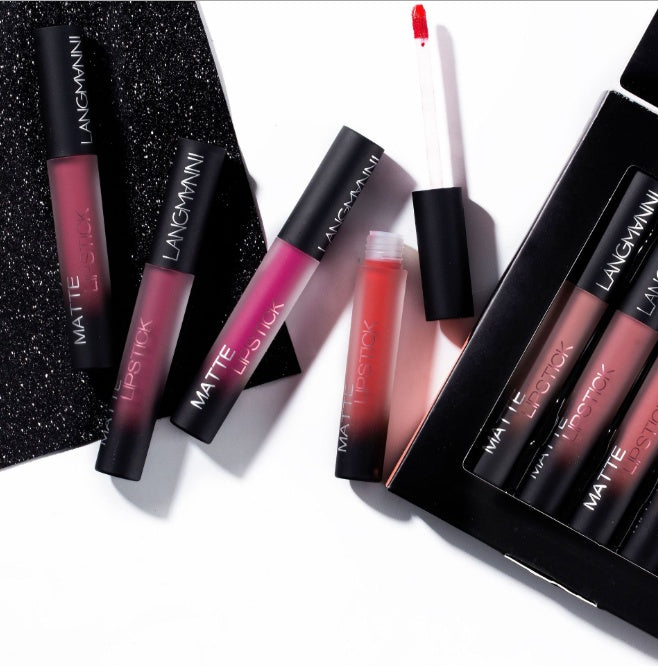 Langham Matte Lipstick set with open lip gloss and closed case on a white background