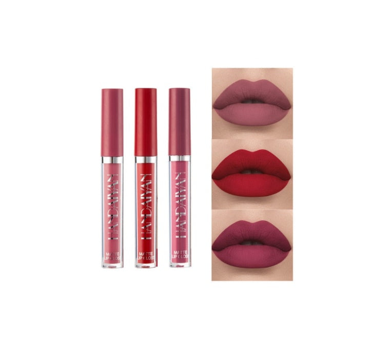Three lipsticks in different shades with a close-up of lips wearing them on a white background.